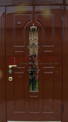 Красивая металлическая дверь со стеклом и ковкой ДСК-33 в Воскресенске