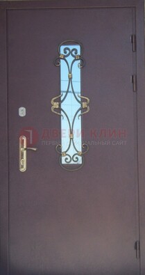 Металлическая дверь со стеклом и ковкой ДСК-77 в Воскресенске