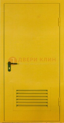 Желтая металлическая противопожарная дверь с вентиляционной решеткой ДТ-15 в Воскресенске